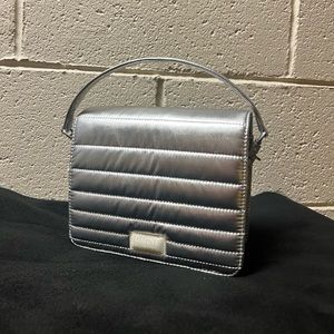 Dagne Dover puffer crossbody bag in silver!